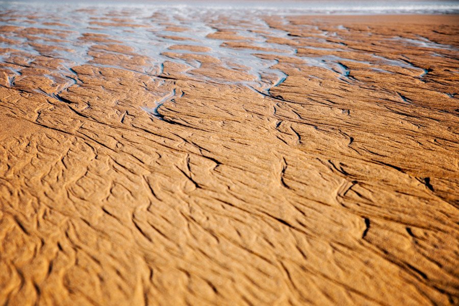 Išplautas vandenyno smėlis
