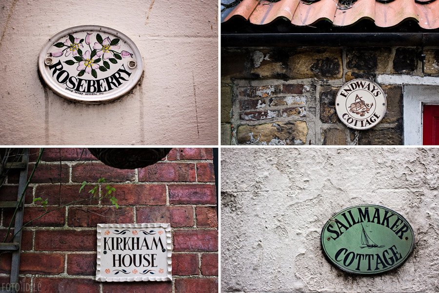 Keramikinės namų iškabos Robin Hoods Bay Jungtinėje Karalystėje