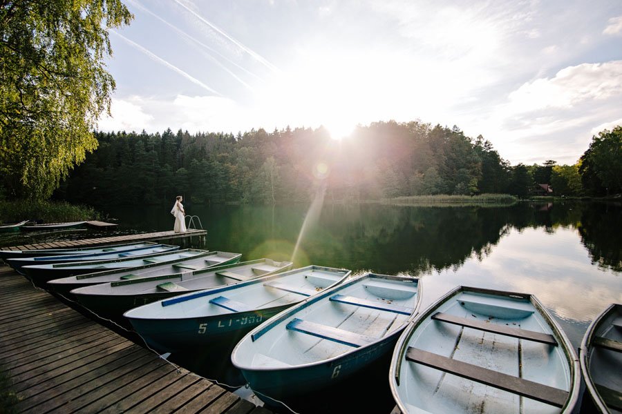 Saulės blyksniai vestuvių fotosesijoje prie Žaliųjų ežerų